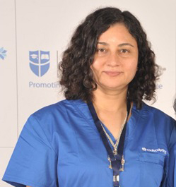 Avatar of Dr Vinita Sharma smiling warmly, blue background with white text Dr Vinita Sharma, testimonial section for PGDFM graduate, positive and welcoming tone
